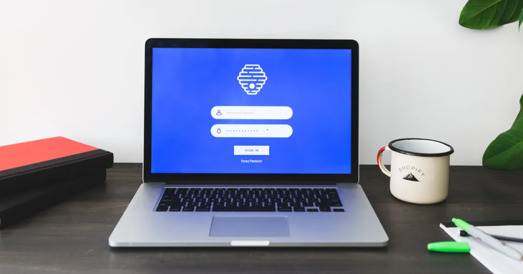 Macbook with a log in screen for a web cryptocurrency wallet.